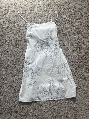 Sabo Skirt White Spaghetti Strap Mini Dress with Abstract Face Line Art
